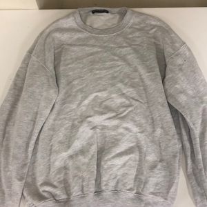 This is a pullover sweatshirt from Brandy Melville